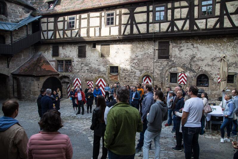 A crowd in a castle